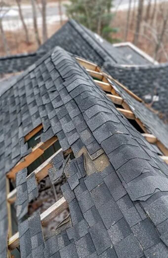 Storm Damage Roof Replacement X